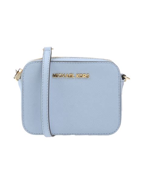 michael kors crossbody blue and silver|Michael Kors blue denim purse.